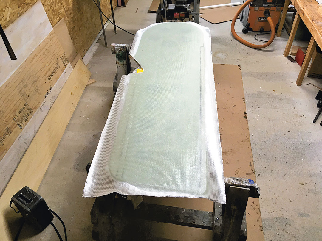 Centerboard fiberglass layer