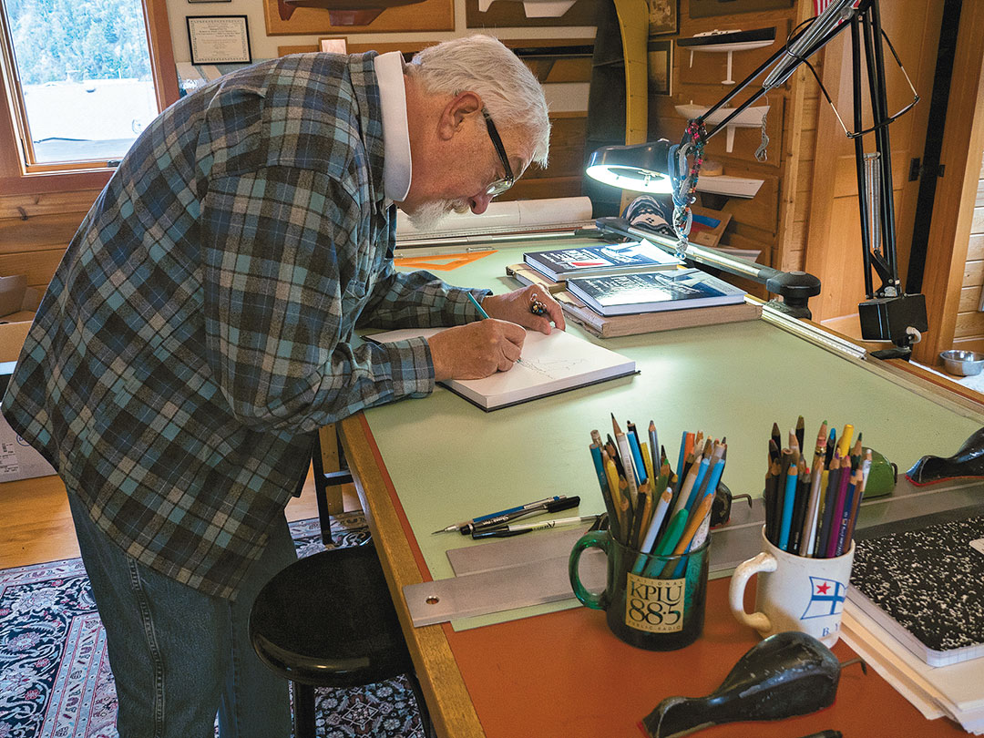 Bob Perry boats designer signing a book