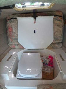 The author replaced his boat’s chemical toilet with a custom-built kit unit he made to fit the space.