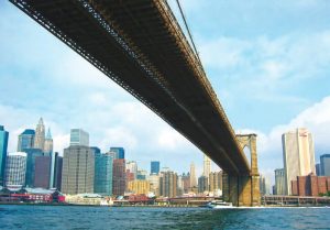 The city skyline rose up as Pelorus glidedunder the famed Brooklyn Bridge.
