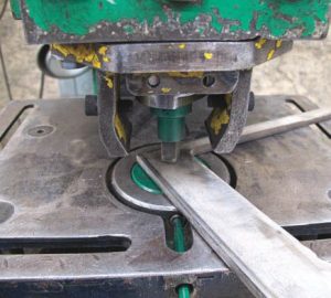 a punch press andspecialized dies can be used to create
holes for carriage bolts, but care must be
taken to avoid damaging the metal.