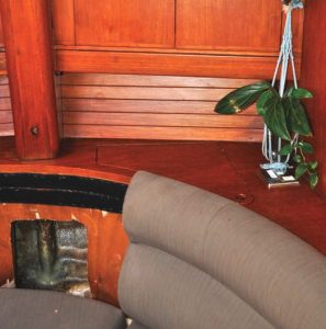a small hole behindthe settee was enlarged
to provide better access to
the chainplates.