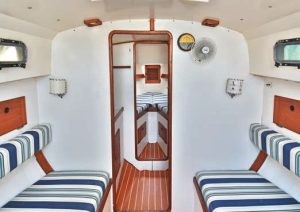 looking forward from themain cabin. Bulkheads are white with
varnished wood trim for the classic New
England treatment.
