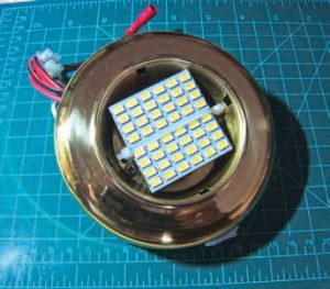Two LED arrays inside the light housing are held in place with tie wrap.