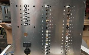 The drilled panel with some test parts fits well.