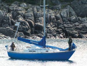 Mystic departs a sheltered cove on LakeSuperior’s Canadian north shore after social time rafted
with Fred and Jennifer Bagley’s Caliber 38, Catamount.