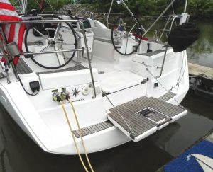One of many clever features on the 379is the drop-down stern platform with
built-in telescoping swim ladder. Below
the platform is a plug with a pull-out
emergency rope ladder, allowing a
person to exit the water even if the
platform is retracted.