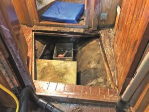 Removing the shower pan provides abetter view of the damage.