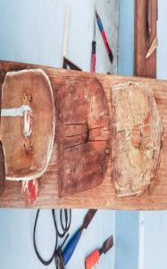 the original reinforcement in thecenterboard trunk shows damage and delamination.