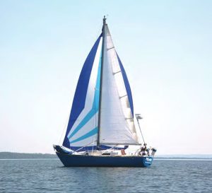 soon after sewing their own Sailrite spinnakerfrom a kit in 2010, Karen and Jerry took photos while
sailing on Lake Superior’s Canadian northern shore by
Red Rock, Ontario. Jerry singlehanded the boat while
Karen, paddling nearby in their kayak, shot photos.