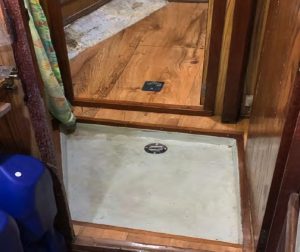a view of the finished project showsthe new, larger bilge access in the forward cabin.