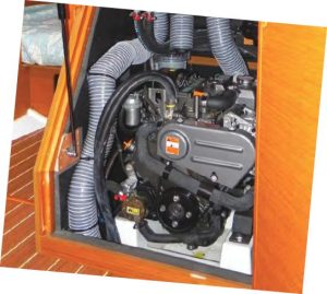 The front of the Yanmar diesel auxiliaryis easily accessed through a gas-spring
supported door.