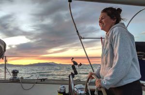 Ashley captains Azimuth and crewthrough a particularly serene sunset in the San Francisco
Bay in the spring of 2019.