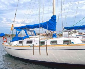 Allamanda is back in the water, with a plan to letthe chainplate oxidize and turn the same green as the portholes.