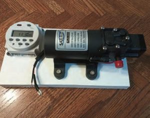 the E.L.D. pump and timer are mounted to a piece of StarBoard.
