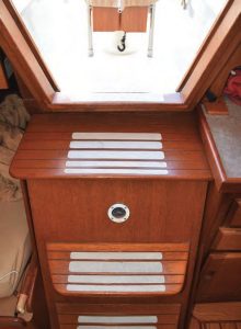 As on many sailboats, the Islander Bahama 30’s engine is housed under the companionway steps.