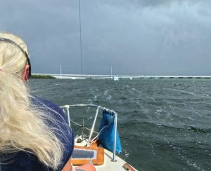 the distinctive streaks of a building force 7 wind are visible on the water.