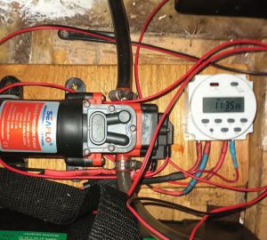 the E.L.D. pump and timer are located near the boat’s battery.