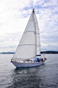 Lady Jane on a close reach, showing her lowfreeboard and sweeping sheer