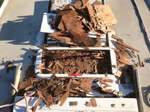 The rotten and completely disintegrated mast step before repair and restoration