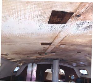 Looking quite industrial, the overhead in the Peterson34 was bare, without any headliner, bottom left.