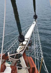 The bowsprit accommodates both headsailfurlers; loads, which are substantial,
are taken up by a bobstay. Note the beefy
samson post, the bulwarks that allow
reinforcements of the stanchions, and
the extra blocks of wood strengthening
the hawse pipes, top left. Photo courtesy
Bill Norrie.