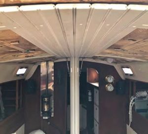 The first pieces, between the companionway slider andthe mast, are in place.