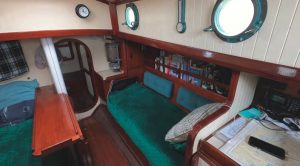 Despite being just 28feet long, the BCC’s main saloon is quite
comfortable, including a settee to
starboard with storage above and below
and a cabin heater.
