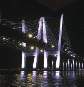 The Tappan Zee Bridge looks like modernart when lit up at night, top left.