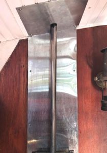 Johnny cut a stainless steel plate to fit around the chimney and coverthe gap