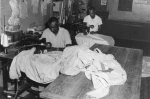 Downes and AlbertCurtis mending sails
at the loft in Oxford,
top left. By H. Robins
Hollyday. Photograph
from the collection of the
Talbot Historical Society.