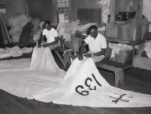 Downes Curtis, left,and his brother,
Albert, making sails
at Curtis’ loft in
Oxford, Maryland,
bottom. By H. Robins
Hollyday. Photograph
from the collection of the
Talbot Historical Society.