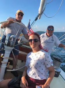 Tom at the wheel of the12 Metre Intrepid, with
Tomfoolery crew members
Katie and Mike enjoying
the ride.