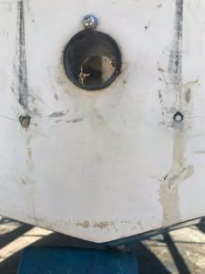 A closeup of the boltholes, now filled, that
were the source of the
mystery leak in Osprey
when the boat was
under sail.