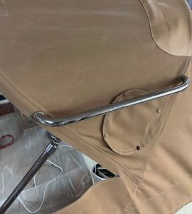 Added hard legs and hand grabsmake this dodger incredibly sturdy.
Little details like a red snap on the
port window cover help clients easily
install them in the correct locations