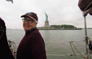 man with statue of liberty