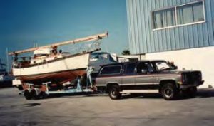 truck pulling sailboat