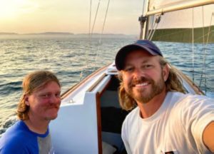 men on sailboat