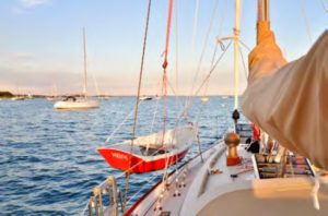 sailboat with dinghy