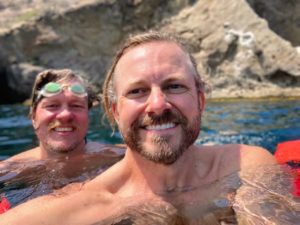 men in water