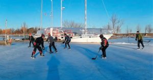 men playing ice hockey