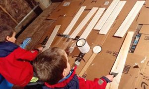 young boys painting