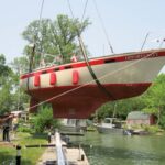 boat being craned into water