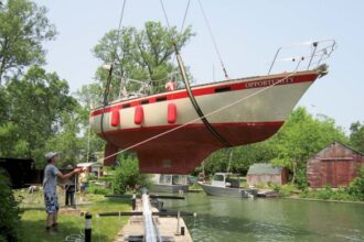 boat being craned into water