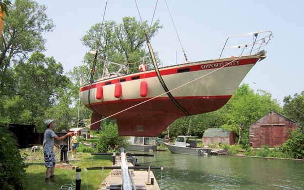 boat being craned into water