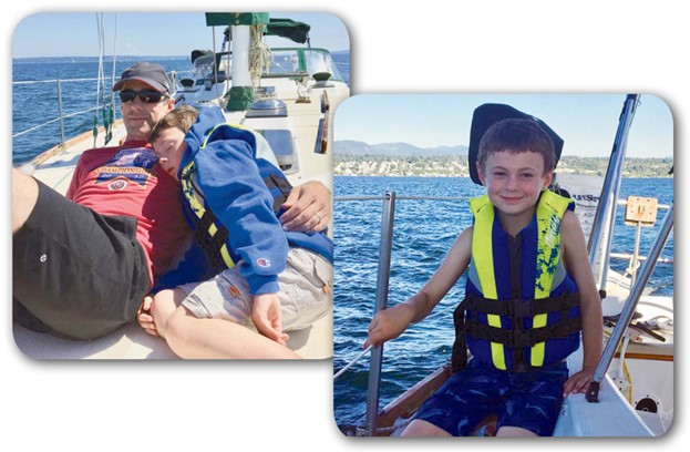 man and children on a boat