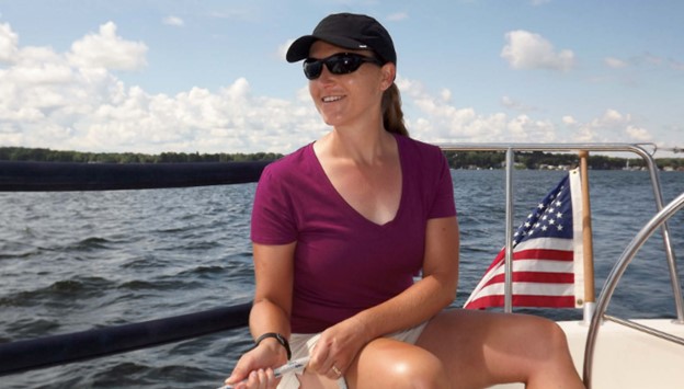 woman trimming a sail