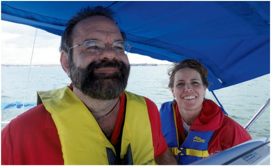 man and woman on a boat