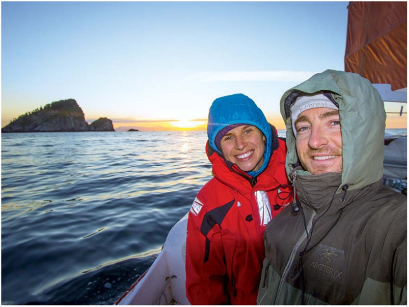 man and woman at sunset