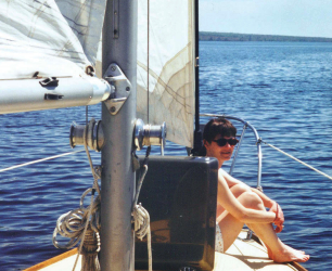 A long, long time ago . . . Cyndi enjoyed the sun and the view from Barracuda's foredeck.